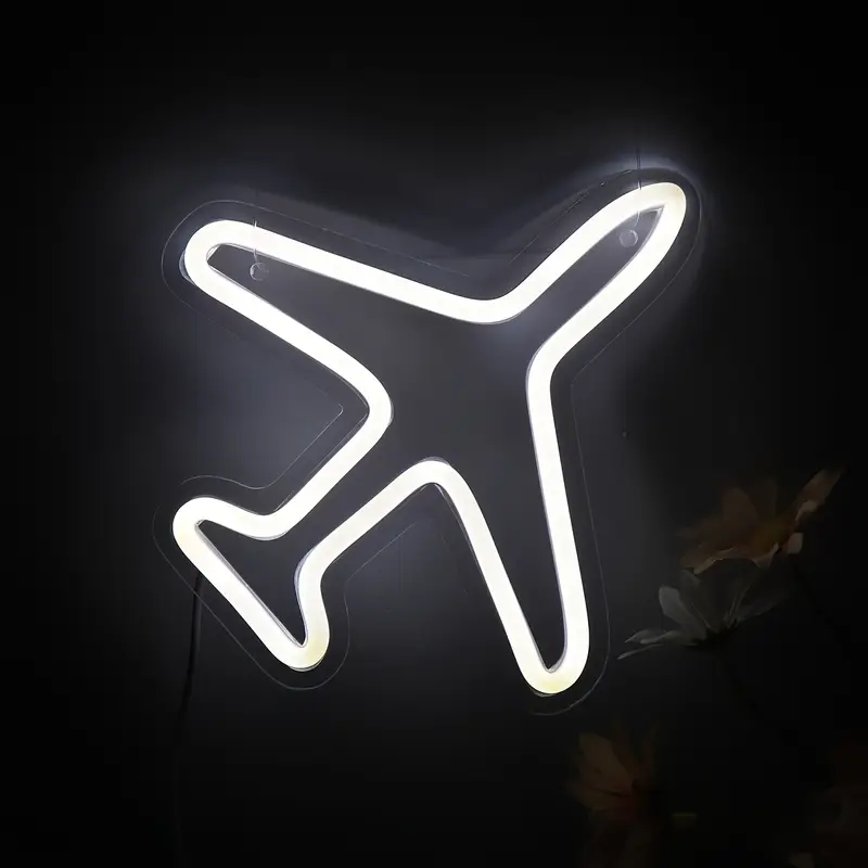 Handmade neon sign in the shape of an airplane